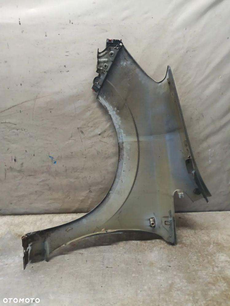 * OPEL ZAFIRA B BŁOTNIK PRZEDNI PRZÓD PRAWY Z163 - 4