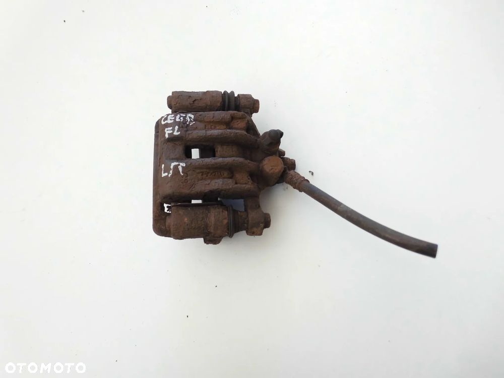 ZACISK HAMULCOWY KIA CEED I LIFT HYUNDAI I30 LEWY TYLNY ORYGINAŁ