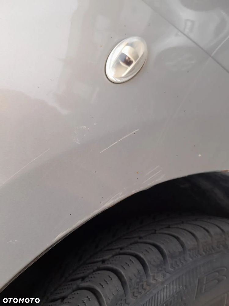 CITROEN BERLINGO II BŁOTNIK LEWY PRZEDNI LEWY PRZÓD KOLOR: KDDC - 7
