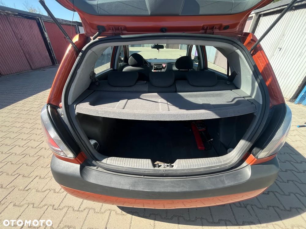 Kia Rio 1.4 (klm) / Comfort + - 12