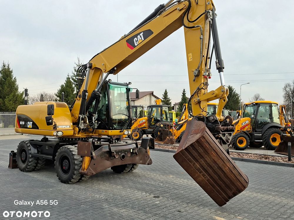 Caterpillar CAT M315D rok 2012 - 17