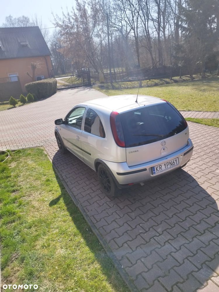 Opel Corsa 1.2 16V Cosmo - 7