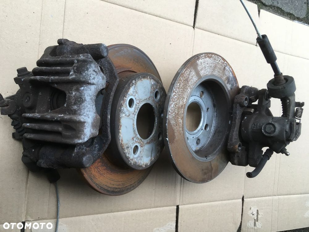 ASTRA G ZAFIRA A ZACISK HAMULCOWY TYŁ PRAWY LEWY TARCZE - 1