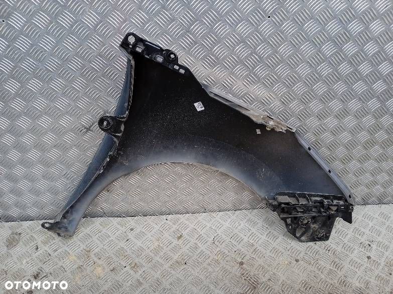 BŁOTNIK LEWY PEUGEOT 5008 - 2