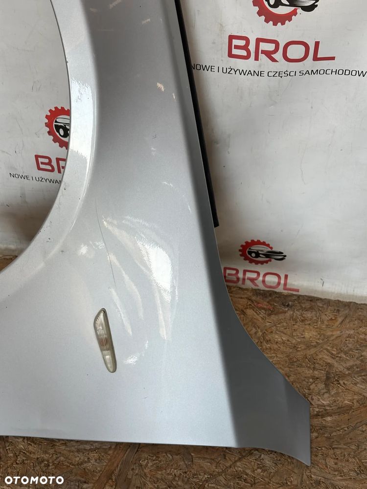 BŁOTNIK PRZEDNI LEWY BMW E60 E61 354/7 - 3