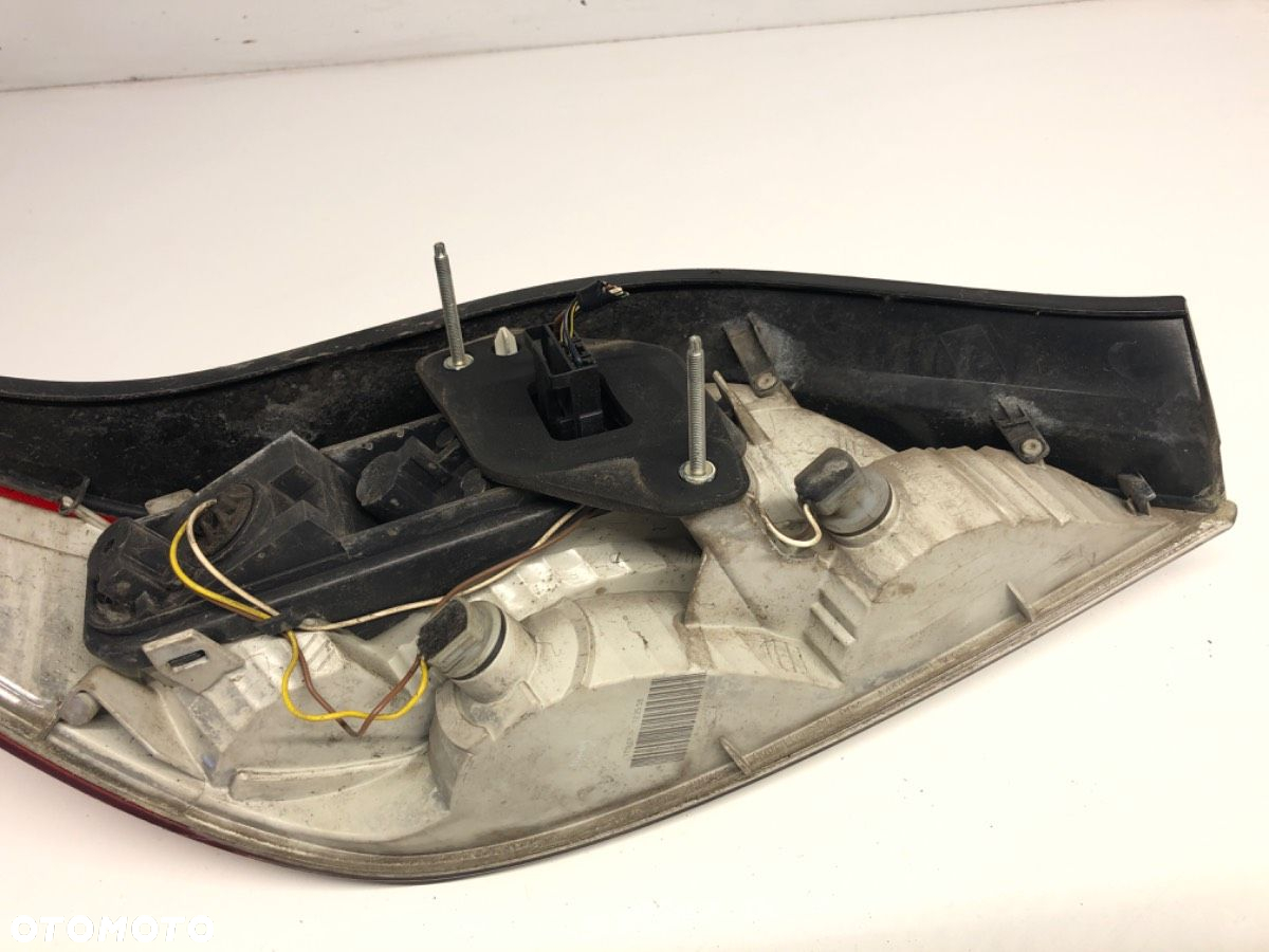 LAMPA PRAWY TYŁ - 144.00 PLN - OPEL ASTRA H TwinTop (A04) 2005 - 2010 1.6 (L67) 85 kW [116 KM] - 4