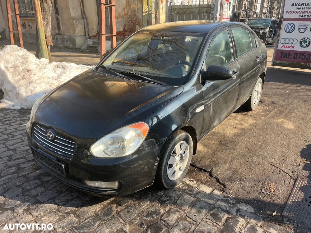Dezmembrez Hyundai Accent 3 negru 2008 1,4 benzina 71KW - 7