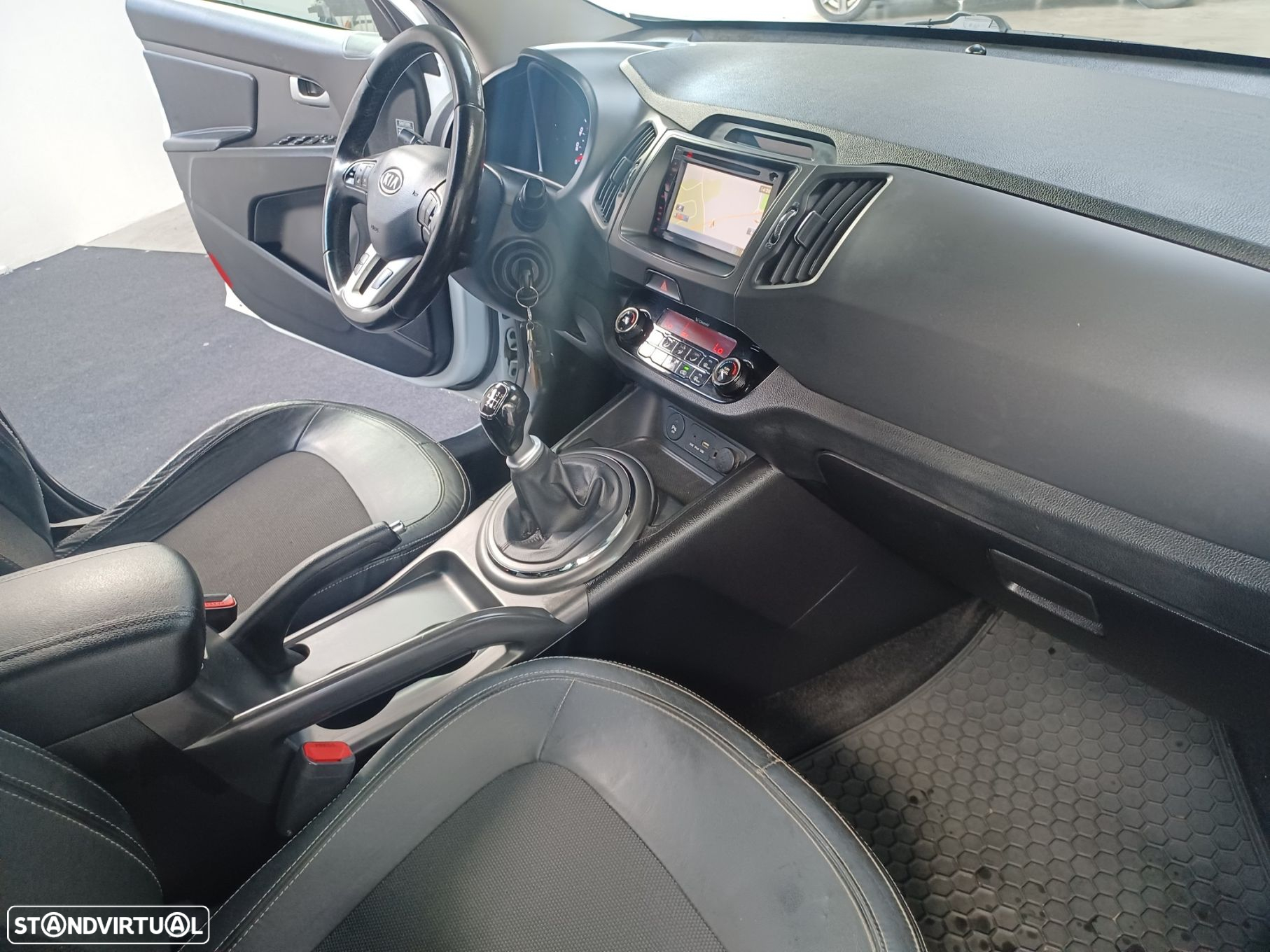 Kia Sportage 2.0 CRDI TX - 19