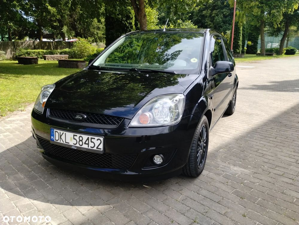 Ford Fiesta 1.4 Ghia - 23