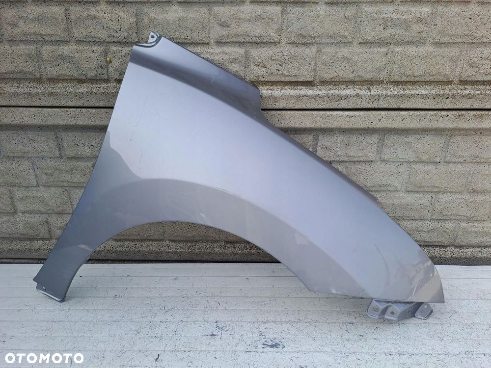 SUZUKI BALENO II 15-22 BŁOTNIK PRAWY PRZEDNI ORYGINAŁ - 1