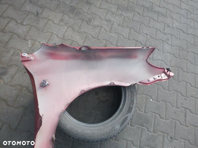 BŁOTNIK LEWY PRZÓD LEWY PRZEDNI TOYOTA COROLLA E12 01-04 KOMBI KOLOR 3N8 - 12