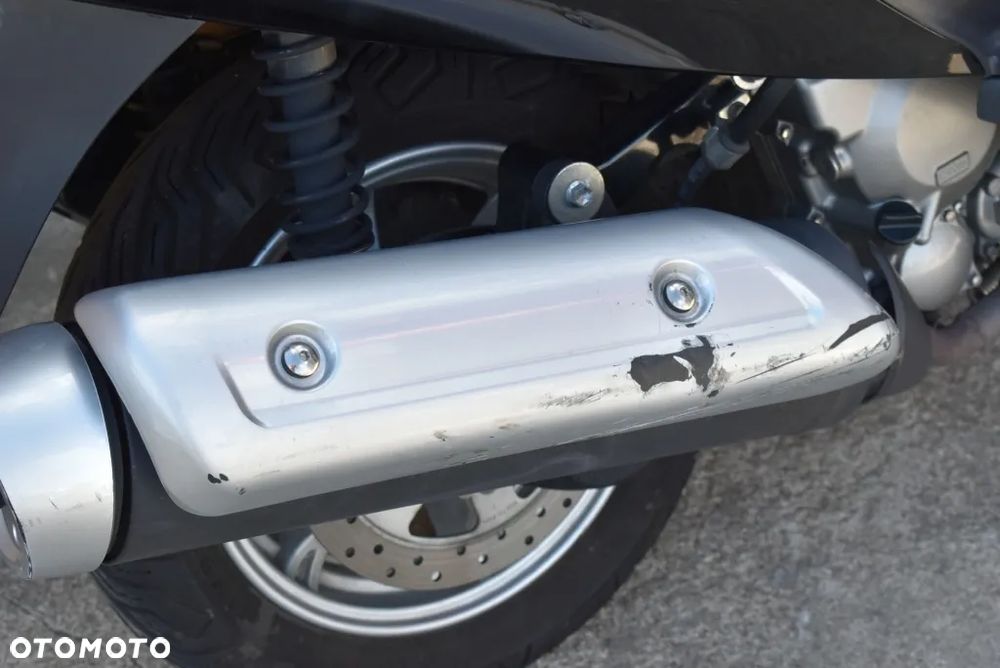 Suzuki Burgman - 27
