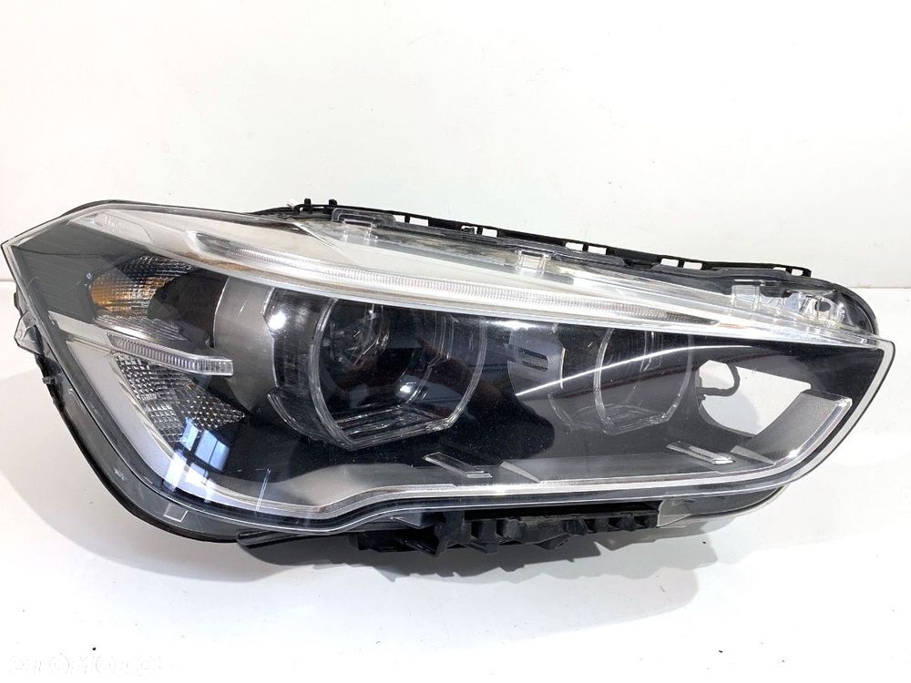 REFLEKTOR PRAWY PRZÓD  BMW X1 (F48) 2014 - 2022 sDrive 18 d 110 kW [150 KM] olej napędowy 2015 - - 1