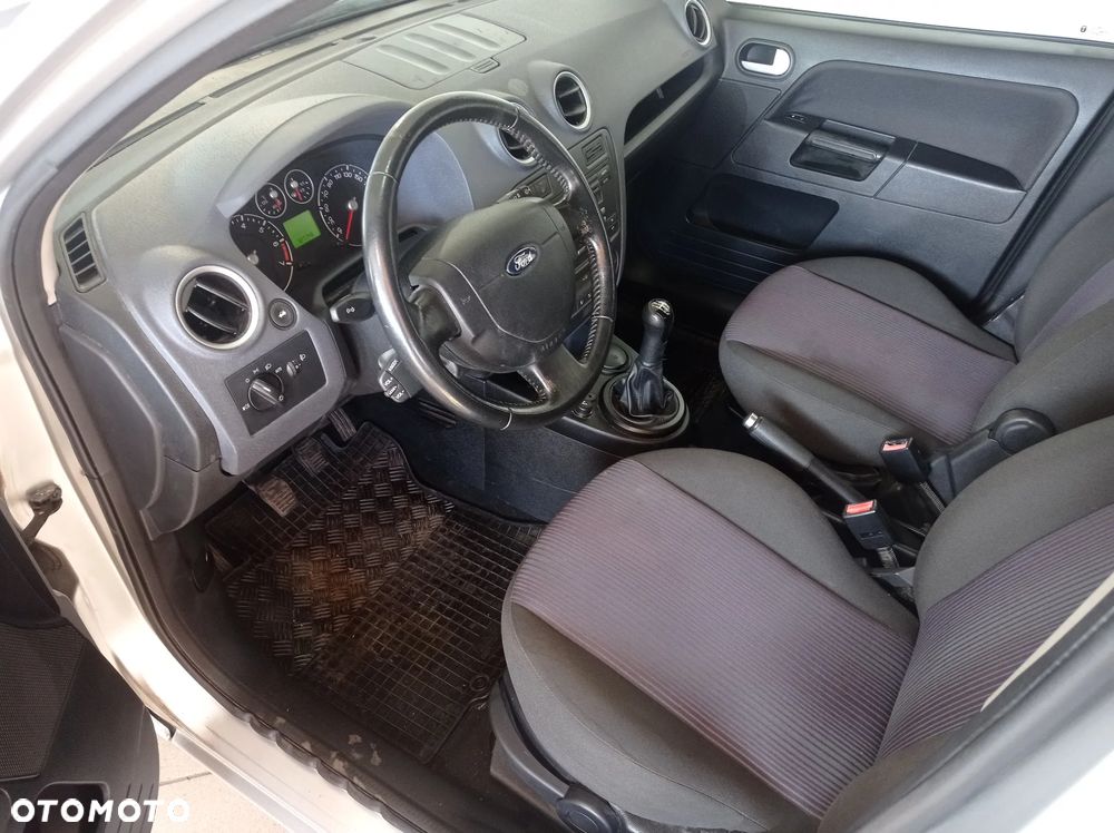 Ford Fusion 1.4 + - 12