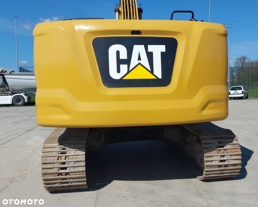 Caterpillar 323 - 11