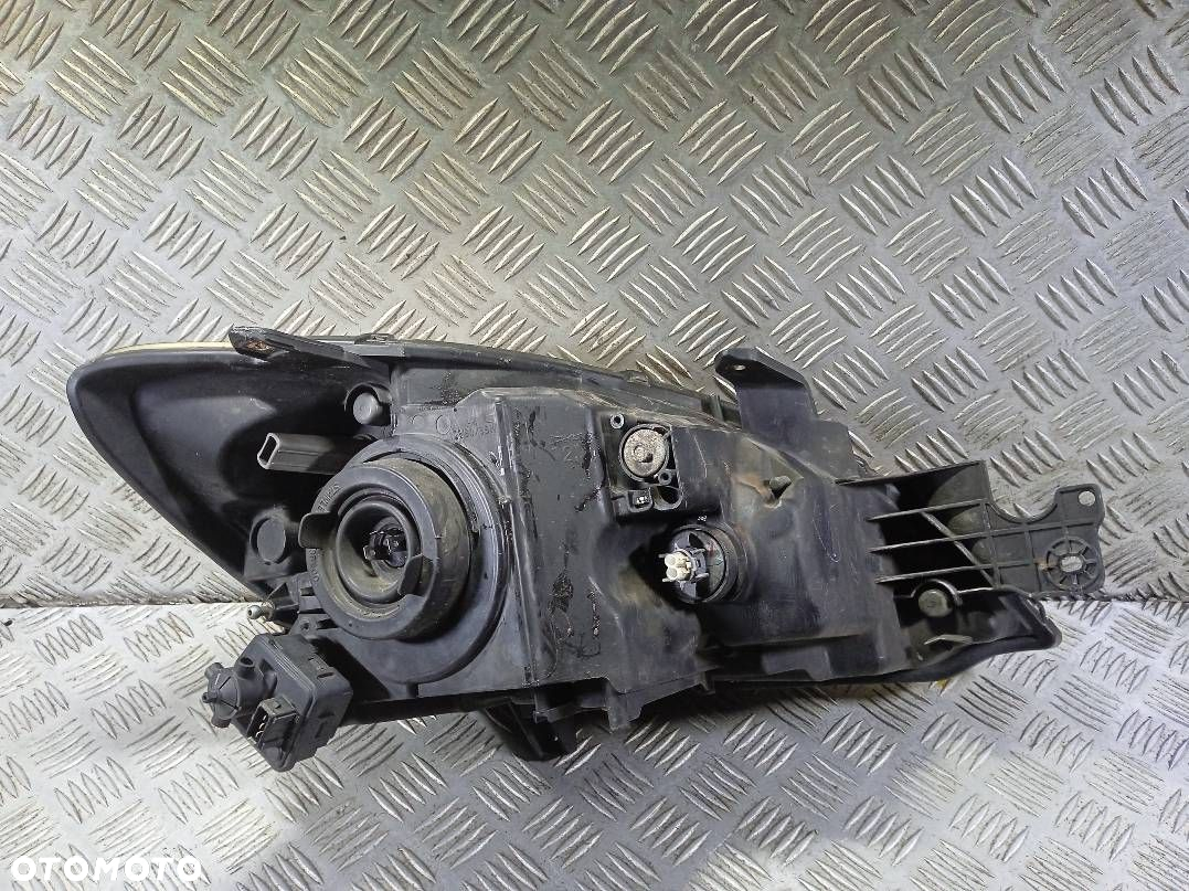LAMPA LEWA PRZEDNIA MITSUBISHI LANCER - 3