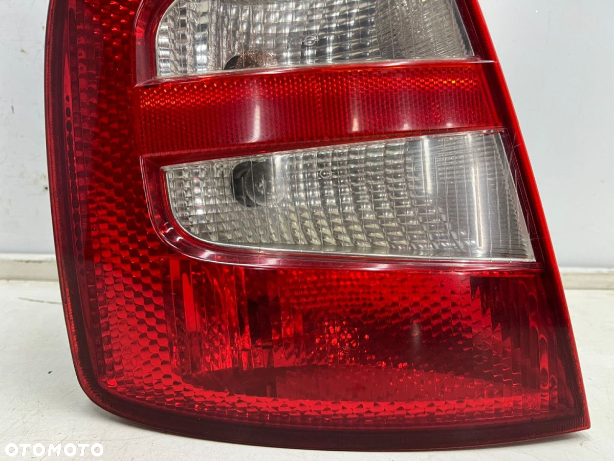Lampa Skoda Fabia I 6y HB 99-08r. LEWA tylna w błotnik EUROPA EU oryginalna lewy tył 6y6945095b - 5