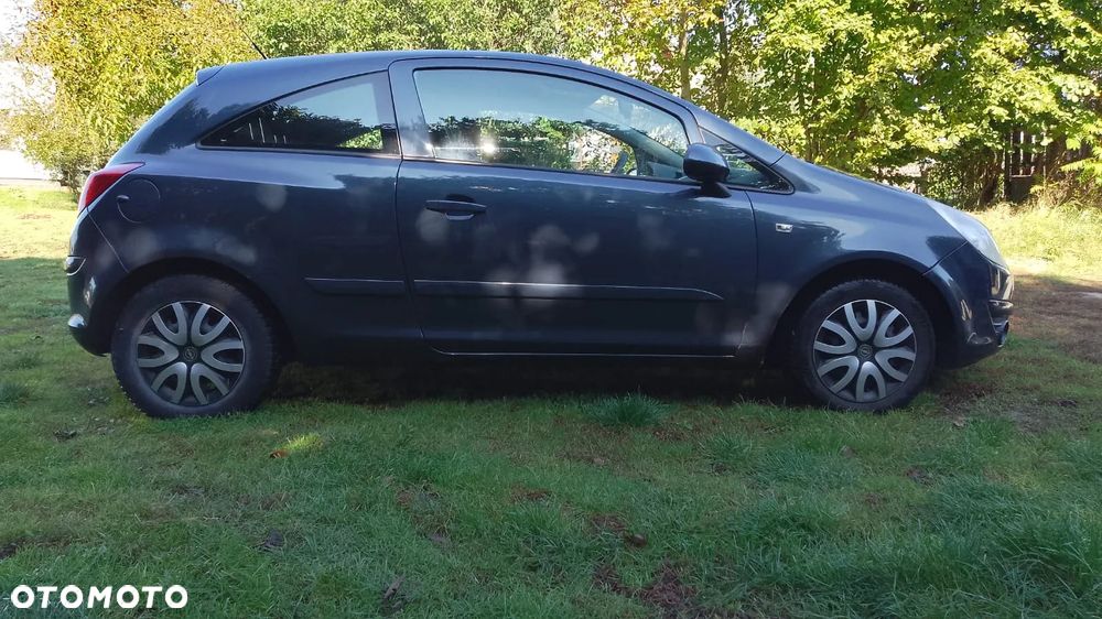 Opel Corsa 1.2 16V Cosmo - 8