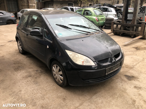 Dezmembrez Mitsubishi Colt CZ3 coupe negru 2005 1.3 benzina cutie automata