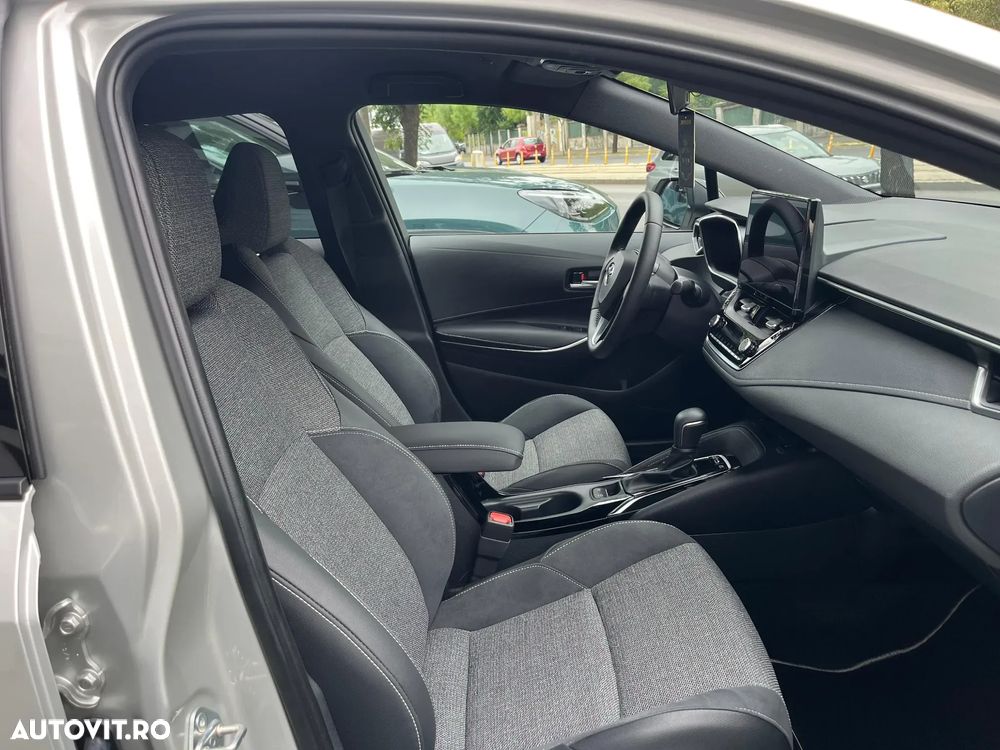 Toyota Corolla TS 1.8 HSD Dynamic - 28