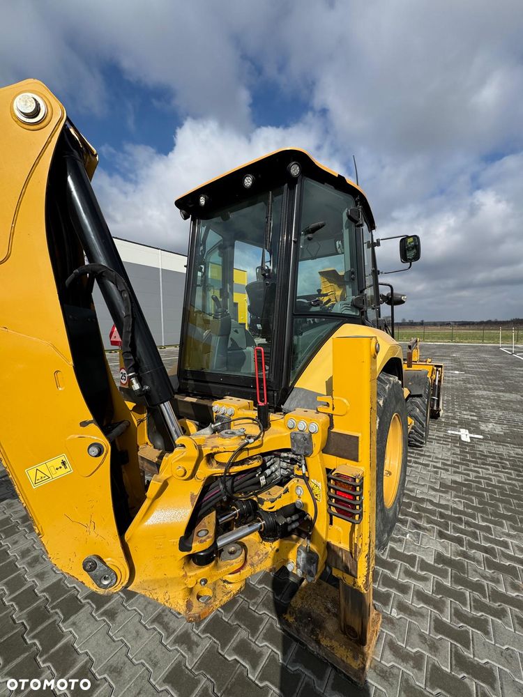 Caterpillar 428 - 16