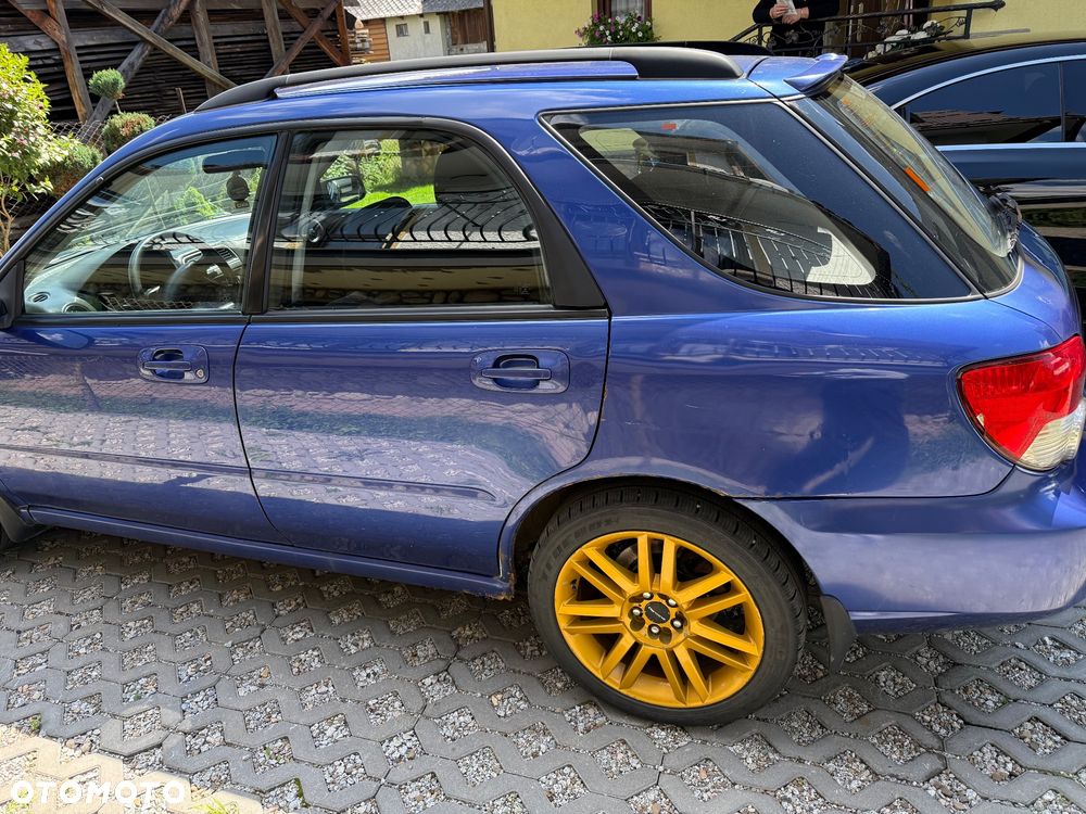 Subaru Impreza SW 2.0 GX 4x4 - 4