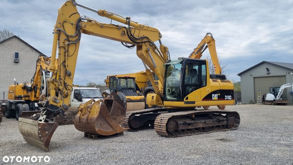 Caterpillar 318C/ Maszyna sprowadzona - 1