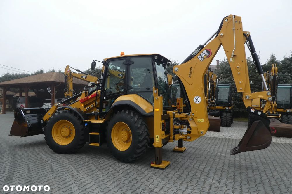 Caterpillar 444 -O7A Z NIEMIEC - 2