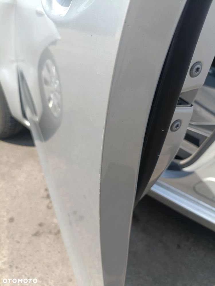 TOYOTA YARIS II 05-11 LIFT 2009 r. 1E7 5D HB drzwi lewy przód LP srebrne * - 9