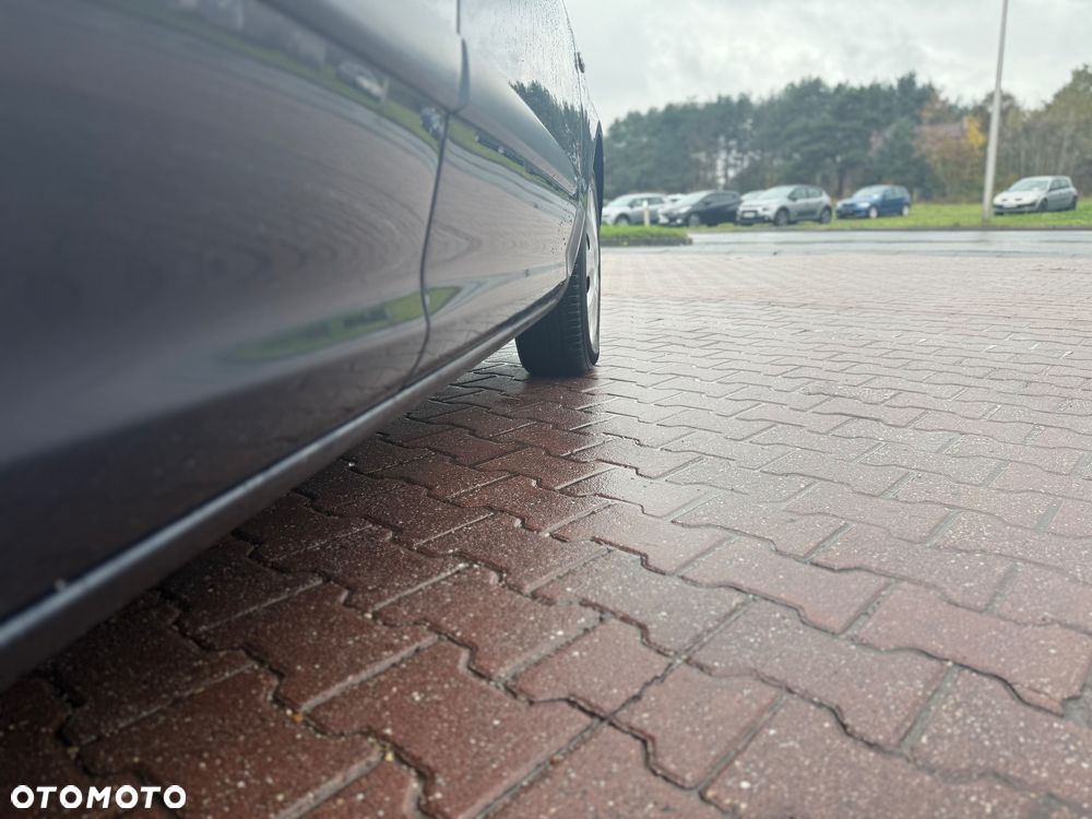 Opel Corsa 1.2 16V Cosmo - 27