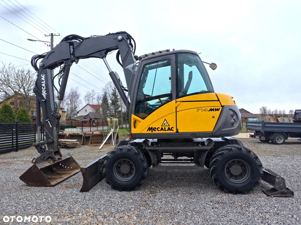 Mecalac 714 - 1