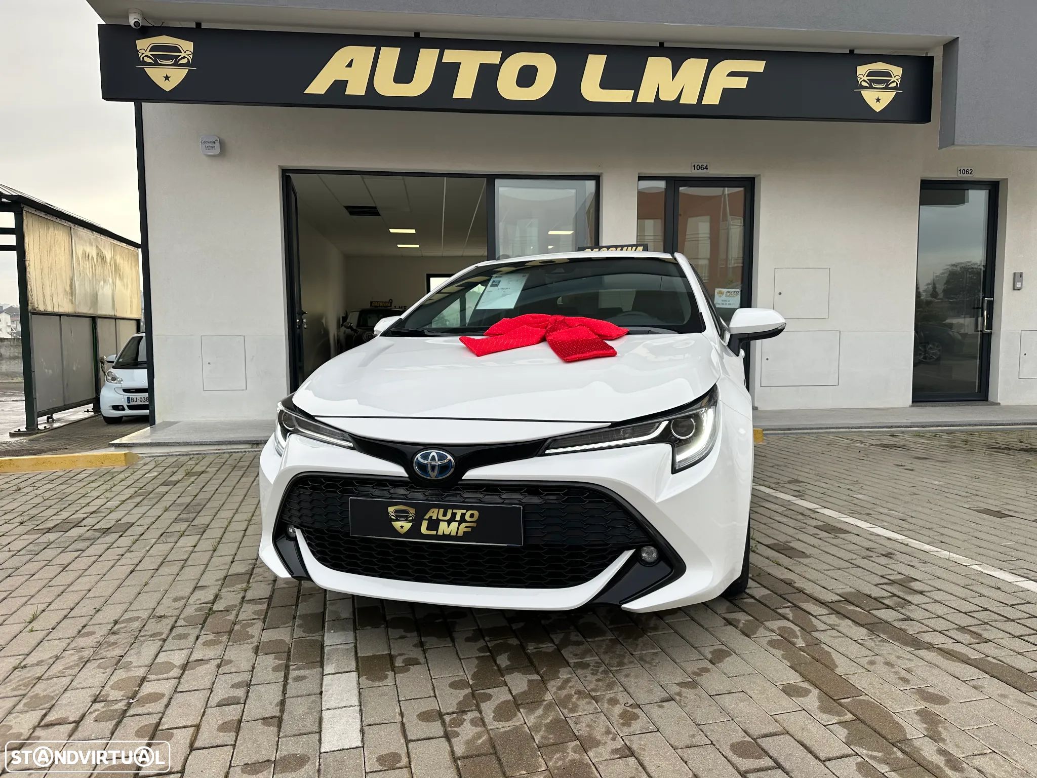 Toyota Corolla 1.8 Hybrid Comfort+P.Sport - 1
