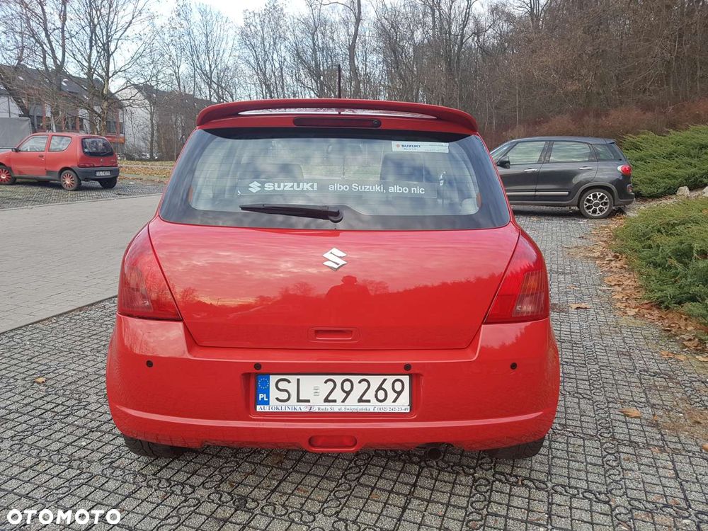 Suzuki Swift 1.3 Club - 4