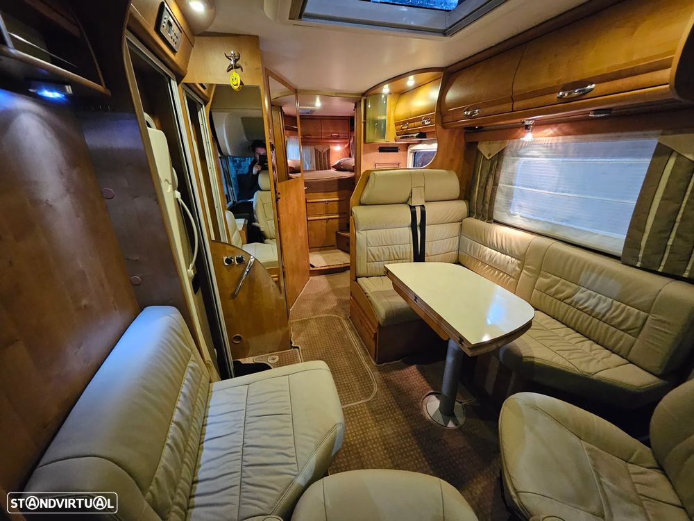 Rapido Le Randonneur 9083DF CHASSI AL-KO CAMA TRANSVERSAL + BASCULANTE - 18