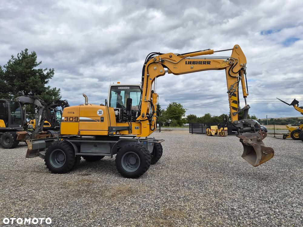 Liebherr A309 Litronic - 3