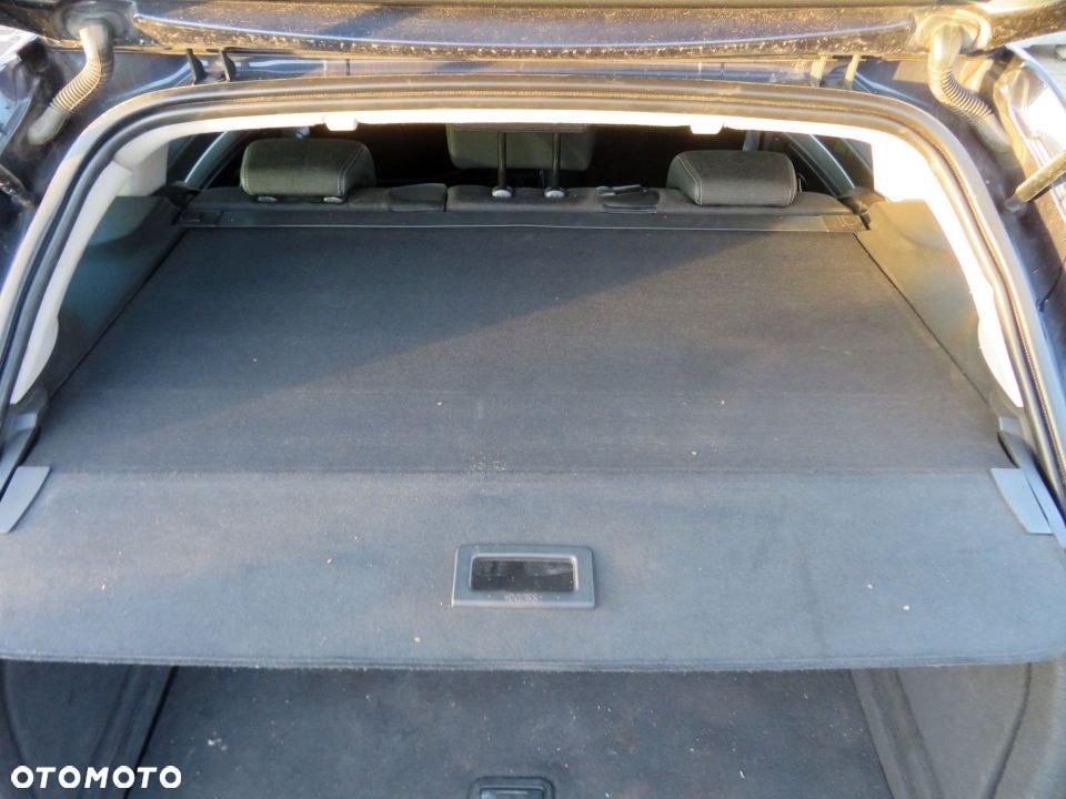 ROLETA BAGAŻNIKA LAGUNA III PH1 KOMBI 799220003R RENAULT 2007-2012 - 1