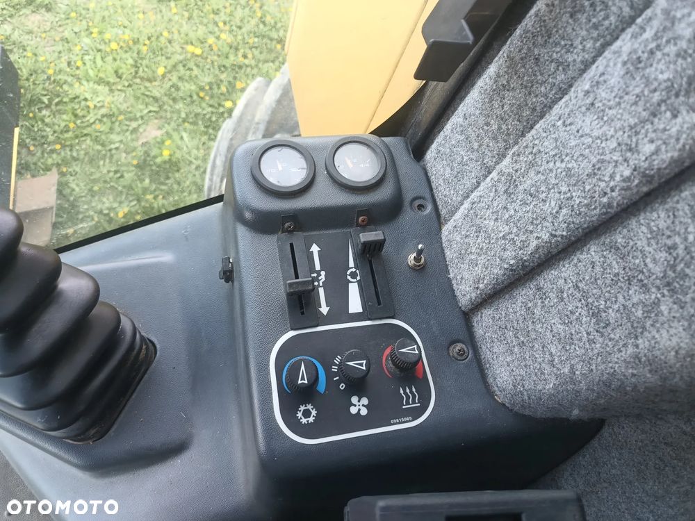 New Holland TX 65 Plus - 12