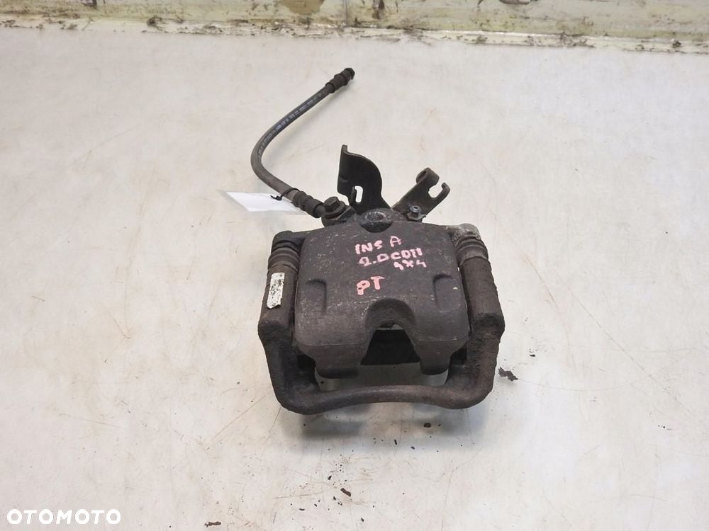 ZACISK HAMULCOWY PRAWY TYŁ OPEL INSIGNIA A 2.0 CDTI 4x4 - 6