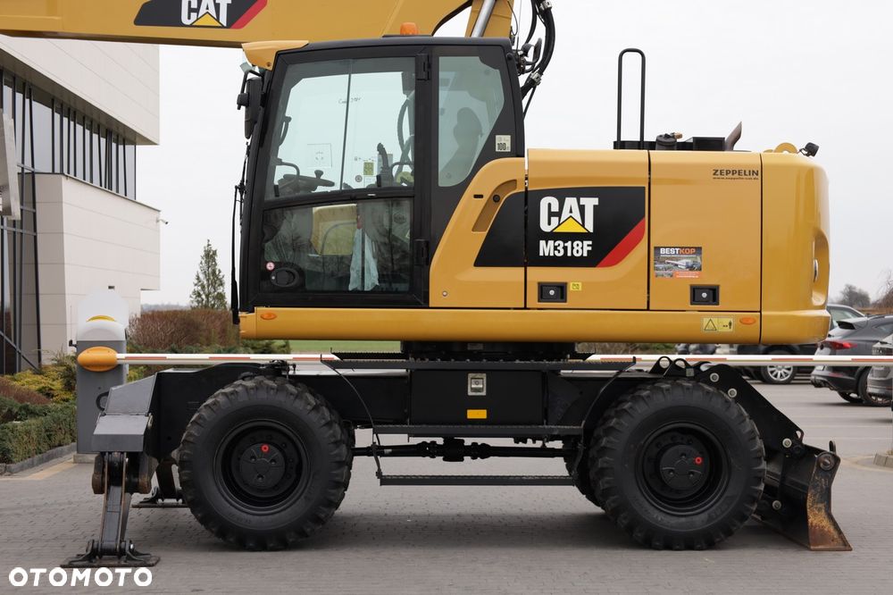 Caterpillar M318F - 11