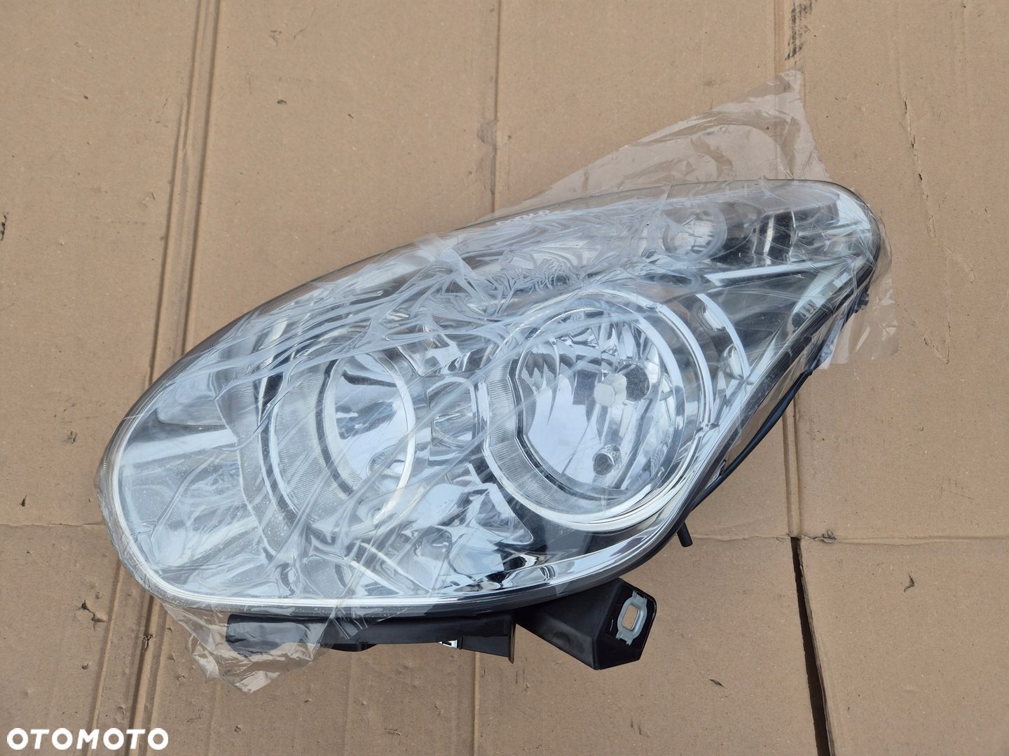 Fiat Doblo lampa lewa.2010-15.Combo 11-. Nowy oryg - 1