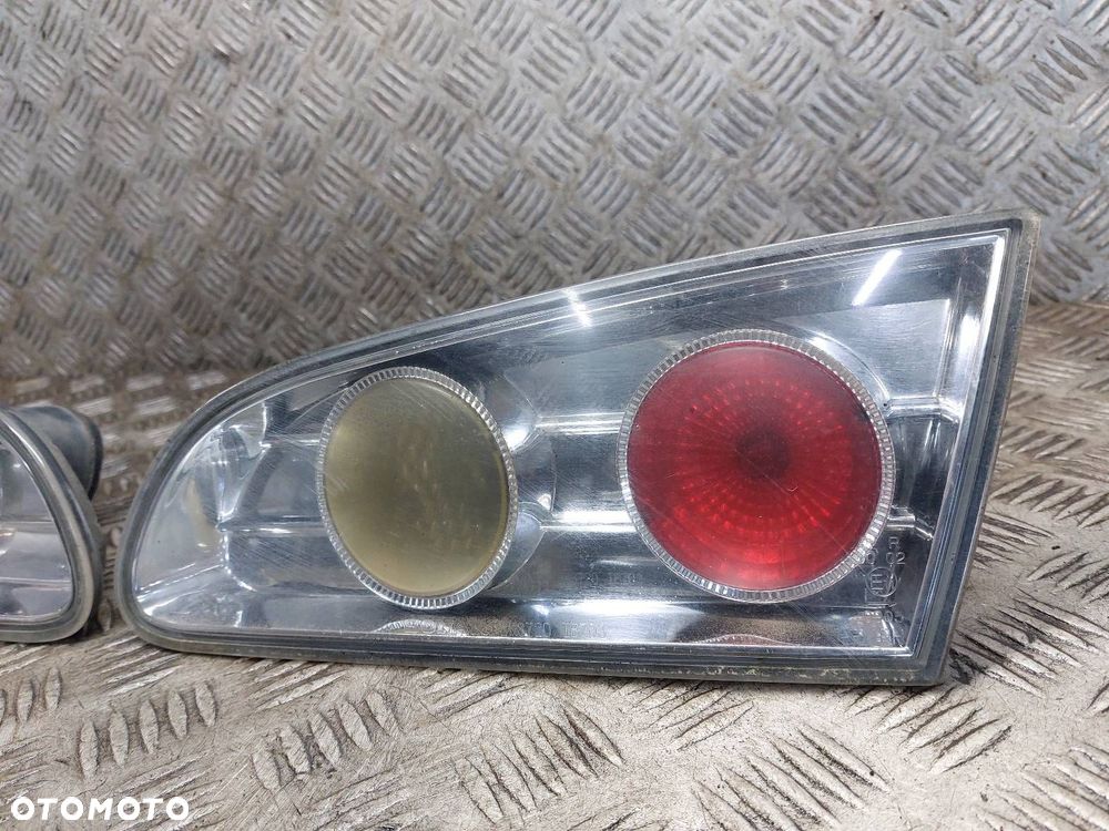 LAMPA LEWY TYŁ PRAWY TYŁ W BŁOTNIK W KLAPĘ SONAR SEAT IBIZA III ID: 237472 - 6