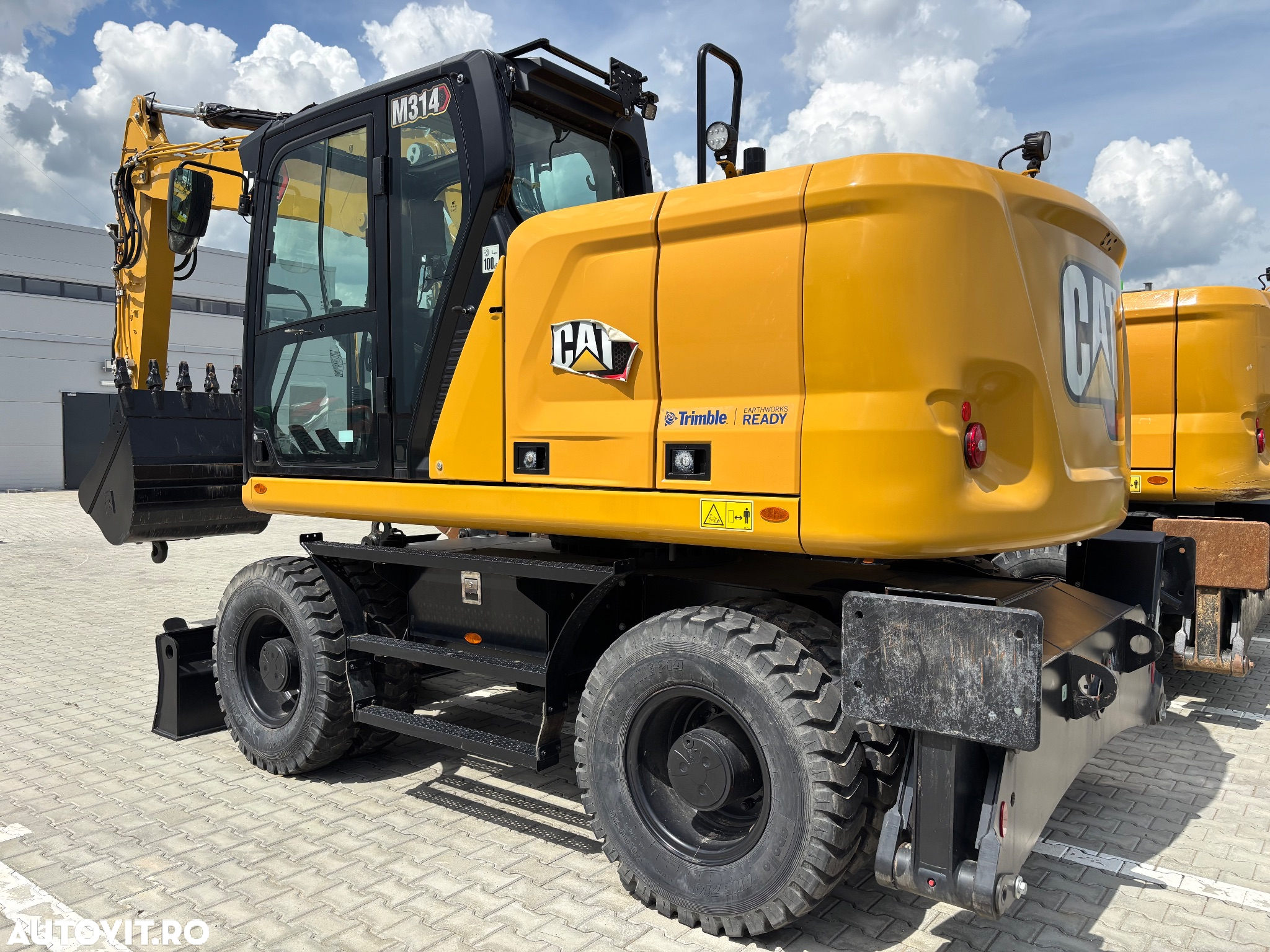 Cat M314, an 2023, utilaj nou/nefolosit, echipat cu sistem de ghidare 3D Trimble din fabrica - 11