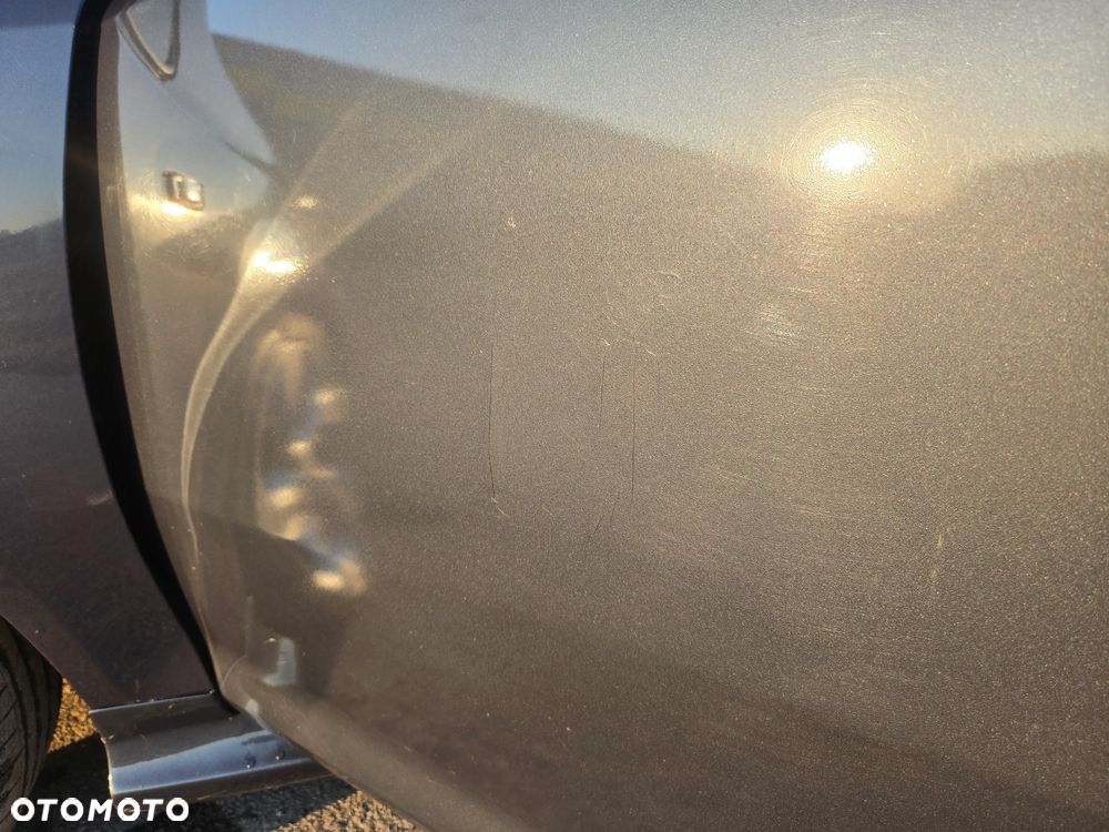 Opel Corsa 1.2 16V Enjoy - 23