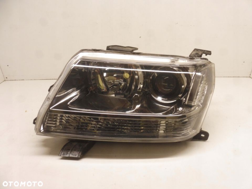 GRAND VITARA 5D REFLEKTOR LEWY SOCZEWKA 2005 2006 - 1