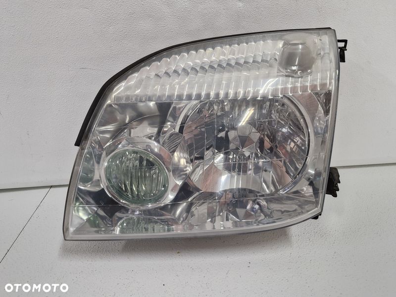 NISSAN X-TRAIL T30 LAMPA PRAWY PRZÓD PRAWA PRZEDNIA REFLEKTOR EU - 1