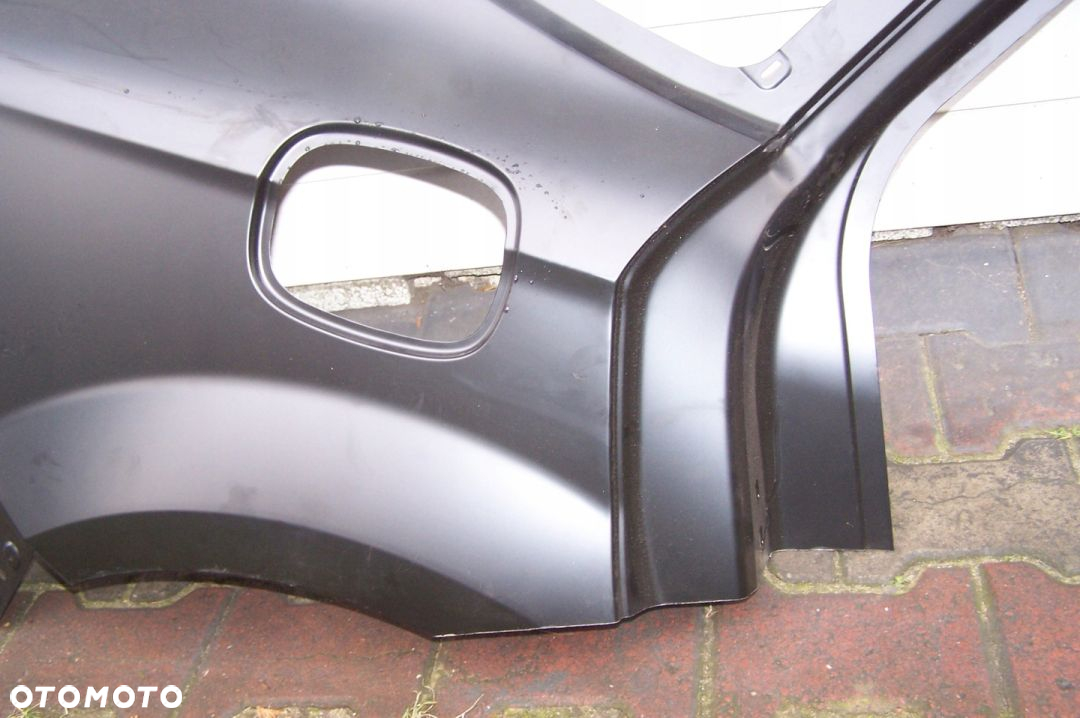 Ford Mondeo mk4 HB błotnik tylny 7S71-A27850-AA - 2