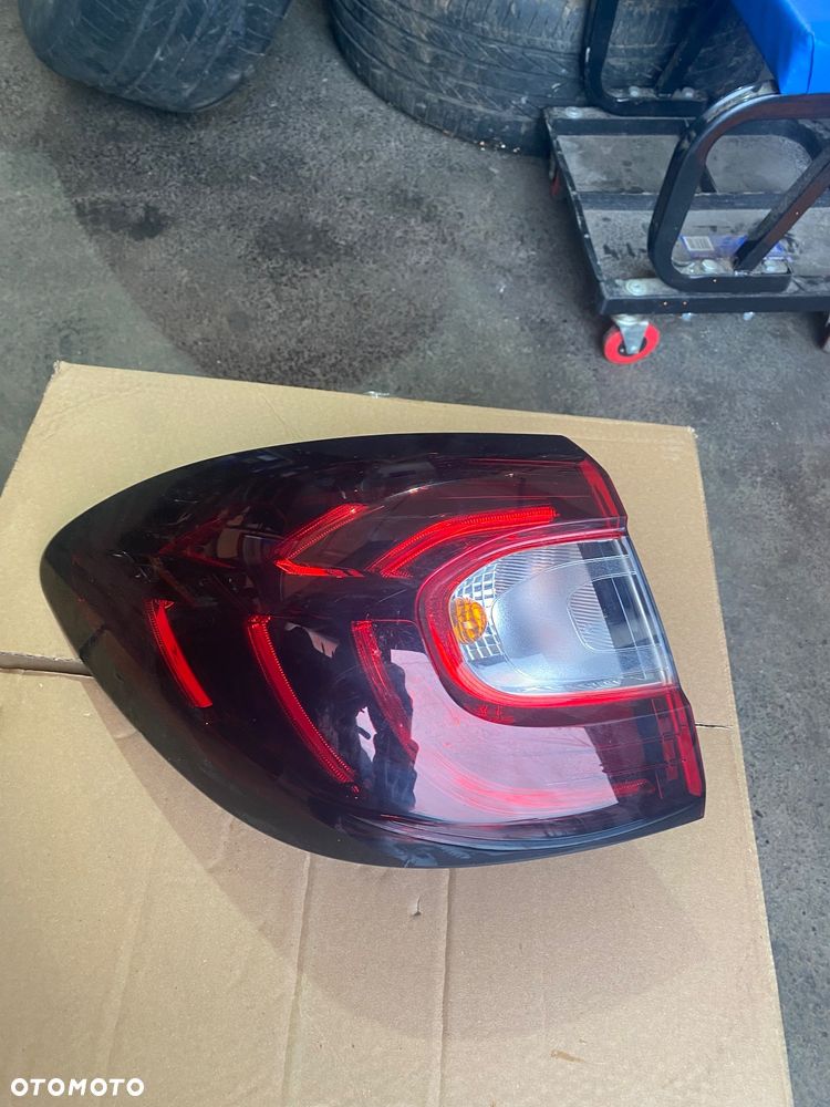 RENAULT CAPTUR 1 I lift LAMPA TYLNA LEWA W BŁOTNIK BŁOTNIKA LEWY TYŁ TYLNIA LEWA 265557849R - 1