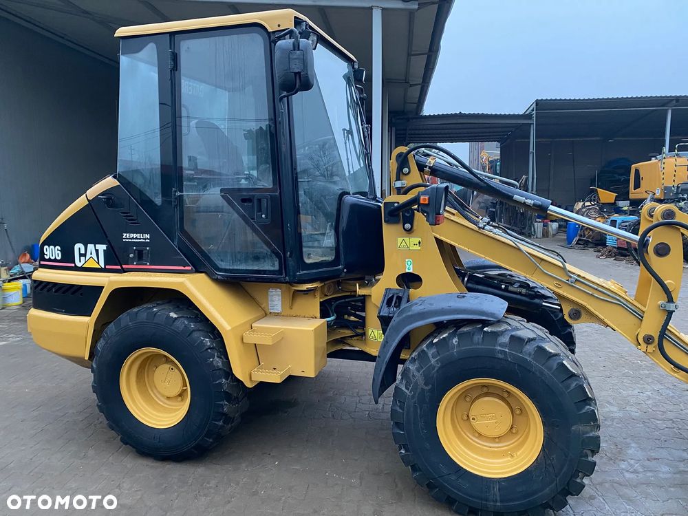Caterpillar CAT 906, ŁYŻKA + WIDŁY, SUPER STAN, z NIEMIEC, SERWISOWANA W CAT - 16