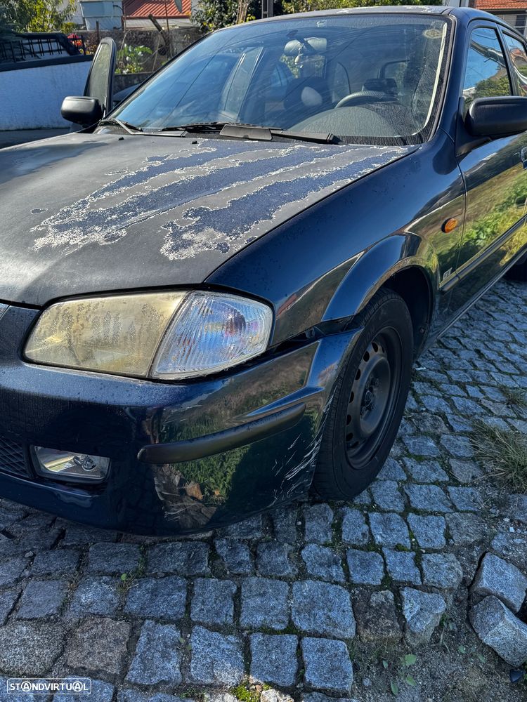 Mazda 323 1998 photo 5
