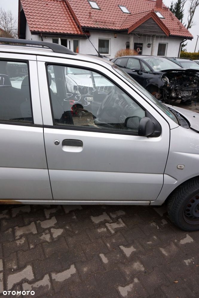 DRZWI PRZEDNIE PRAWE IGNIS II Z2S  SREBRNY SUZUKI 2003-2011 - 1